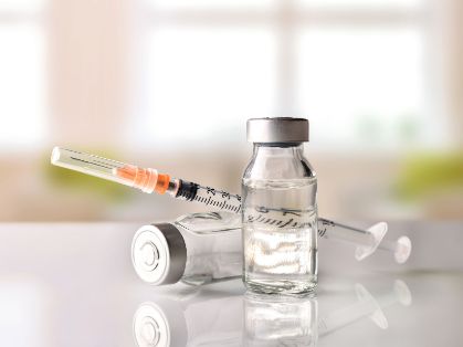 Bild: Impfstoff und Spritze